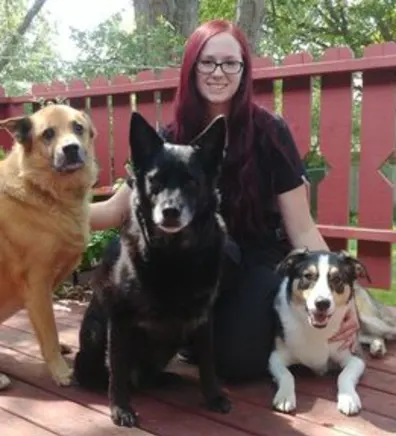 Shannon Patton with three dogs